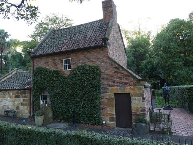 Spray paint was quickly removed from Cooks’ cottage on Tuesday morning. Picture: David Crosling