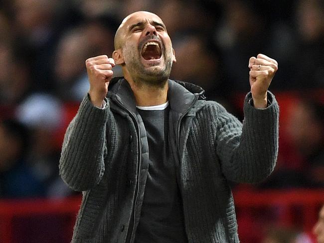 MANCHESTER, ENGLAND - APRIL 24: Josep Guardiola, Manager of Manchester City celebrates after Leroy Sane of Manchester City scored their team's second goal during the Premier League match between Manchester United and Manchester City at Old Trafford on April 24, 2019 in Manchester, United Kingdom. (Photo by Shaun Botterill/Getty Images)