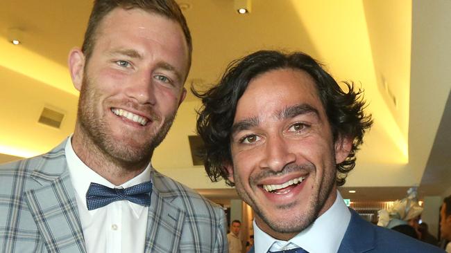 North Queensland Cowboys Gavin Cooper and Johnathan Thurston at the Gold Coast Turf Club. Picture Mike Batterham