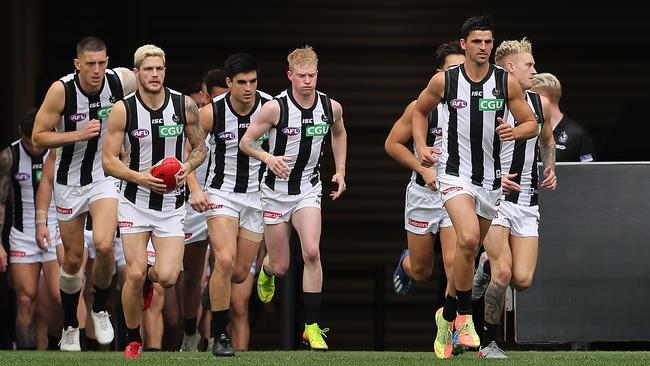 Scott Pendlebury led the Magpies onto the ground against the Eagles – but never made it to the first bounce. Picture: Paul Kane/Getty Images