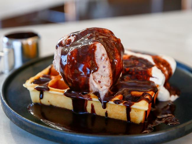 The Devil's Own Ice Creamery’s mega waffle with choc hazelnut fudge ice cream and choc fudge sauce. Picture: PATRICK GEE