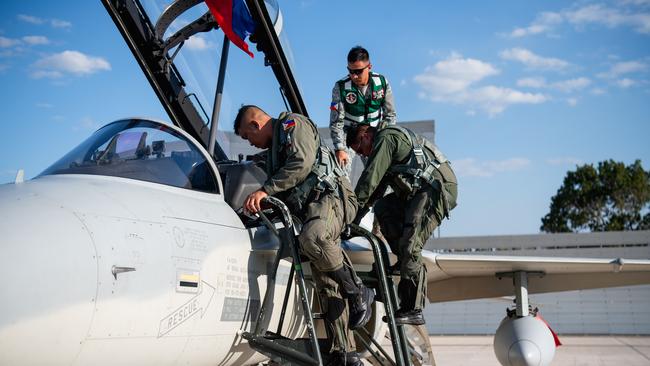 COL Randy M Pascua PAF (GSC) and LTC Michael G Rabina PAF gets off their fighter jets as Filipino fighter pilots touch down in Darwin for Exercise Pitch Black 24. Picture: Pema Tamang Pakhrin