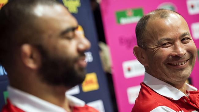 Japan's head coach Eddie Jones (R) and back row and captain Michael Leitch deliver a press conference at the Hilton Hotel in Brighton, on September 21, 2015, during the 2015 Rugby Union World Cup. Japan will face Scotland on September 23. AFP PHOTO / LIONEL BONAVENTURE RESTRICTED TO EDITORIAL USE