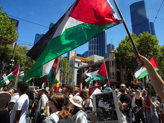 MELBOURNE AUSTRALIA - NewsWire Photos FEBRUARY 18, 2024: Pro-Palestinian Protesters march through the streets of Melbourne.Picture: NCA NewsWire / Luis Enrique Ascui