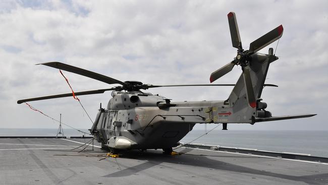 Rotary wing aircraft are also harboured aboard the carrier. Picture: Pema Tamang Pakhrin