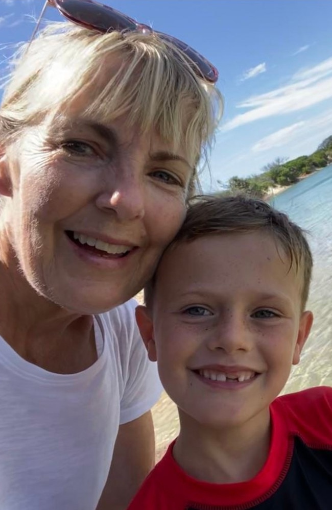 Julie Dignum, 65, of Burleigh Waters, with one of her grandchildren, Alek Lacey, 8, of Tallai on the Gold Coast. Picture: Lacey family