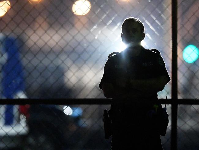 Police at the back of the Buff Club where a man was killed on Tuesday night. Picture: Keri Megelus