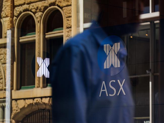 SYDNEY, AUSTRALIA - NewsWire Photos, October 29 2024. GENERIC. Stocks. Finance. Economy. People walk past the Australian Stock Exchange, ASX, on Bridge Street. Picture: NewsWire / Max Mason-Hubers