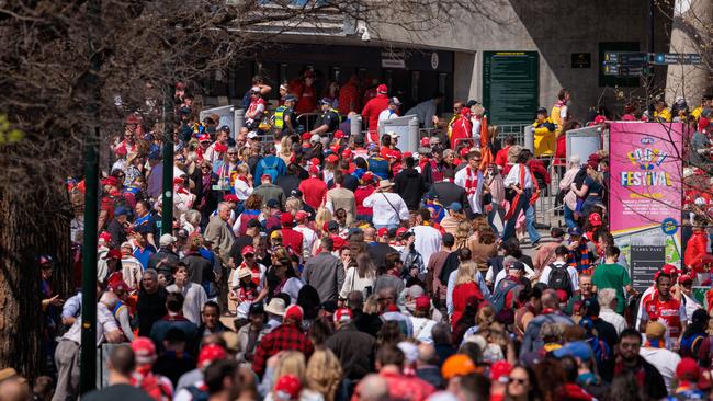 Massive crowds have flocked to the MCG for the Grand Final, some queuing for hours to get their seats. Picture: NewsWire/Nadir Kinani