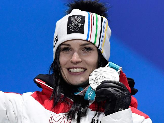 Austria's silver medallist Anna Fenninger Veith poses on the podium during the medal ceremony for the alpine skiing women's Super-G at the Pyeongchang Medals Plaza during the Pyeongchang 2018 Winter Olympic Games in Pyeongchang on February 17, 2018. / AFP PHOTO / JAVIER SORIANO