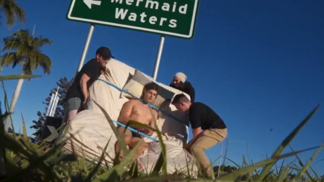 Near nude man strapped to Mermaid Waters sign for online prank | Gold Coast  Bulletin