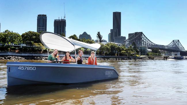 Emily Milikins, Ellise Logan, Emily Whitehead and Lucy Bain enjoying a GoBoat on the Brisbane River. The business could be facing eviction. Picture: Tara Croser