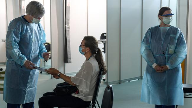 Melbourne Airport's vaccination hub, where an international departure lounge was transformed into a mini-hospital in less than a week. Supplied: Western Health/Penny Stephens