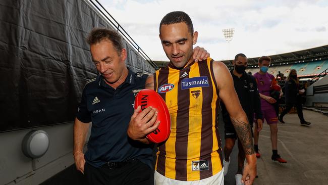 Alastair Clarkson and Shaun Burgoyne leave the field for the last time. Picture Getty Images