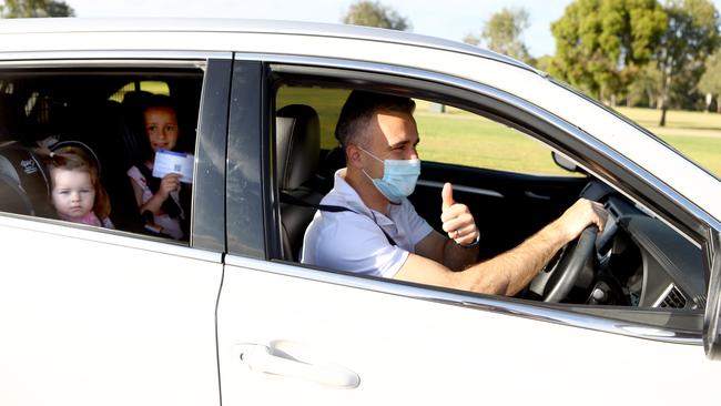 SA Opposition leader Peter Malinauskas drives through the Victoria Park Covid testing site. Picture: Kelly Barnes