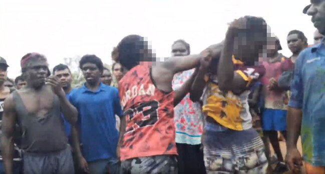 Men were filmed fighting on the streets of Doomadgee. Picture: supplied.