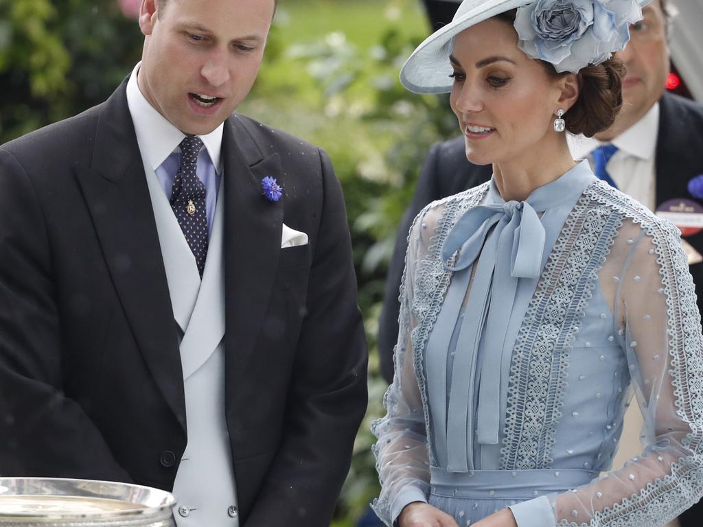 The ‘devastated’ couple were in a motorcade driving behind the motorcycle to Windsor for a Knights of the Garter ceremony after attending Ascot, pictured. Picture: AP Photo/Alastair Grant