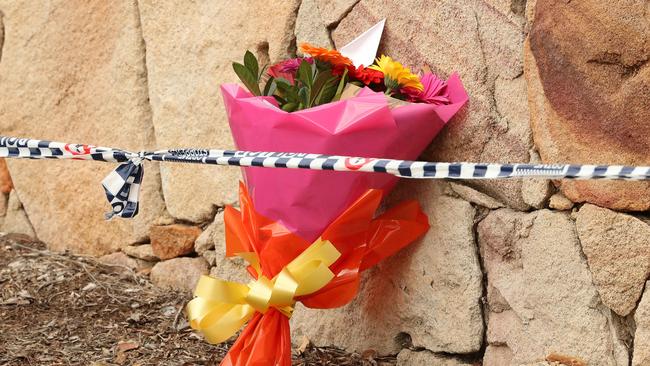 A bunch of flowers left at the scene. Picture: Liam Kidston