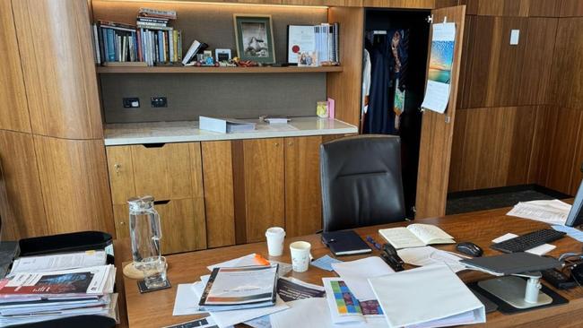 Department of Premier and Cabinet Director-General Mike Kaiser's desk, to prove he hasn't cleared it. Supplied