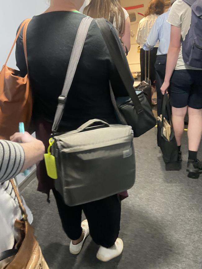 Passenger boarding a Qantas flight in Melbourne.