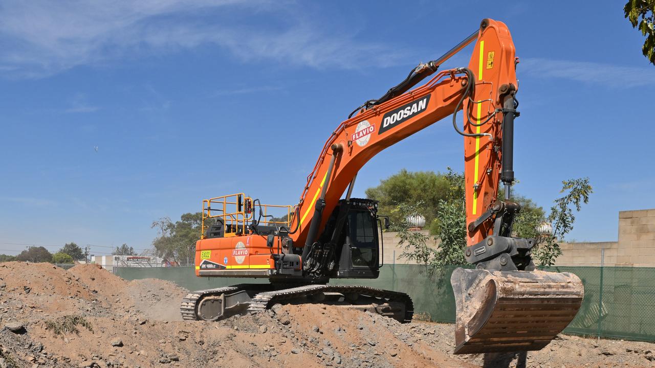 Excavators dig at an old factory site in a last-ditch attempt to find the remains of the three missing Beaumont children before the government-owned site is sold to developers. Picture: NewsWire / Brenton Edwards