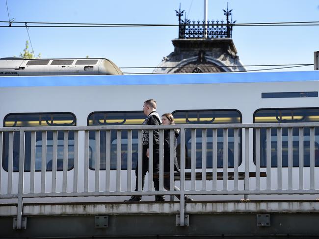 MELBOURNE, AUSTRALIA - NewsWire Photos SEPTEMBER 22, 2023: Passengers board a train at Collingwood station. Picture: NCA NewsWire / Andrew Henshaw