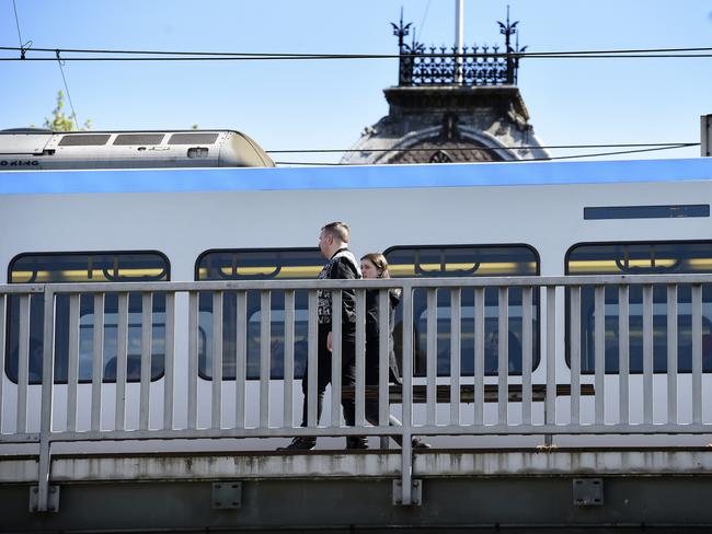 MELBOURNE, AUSTRALIA - NewsWire Photos SEPTEMBER 22, 2023: Passengers board a train at Collingwood station. Picture: NCA NewsWire / Andrew Henshaw