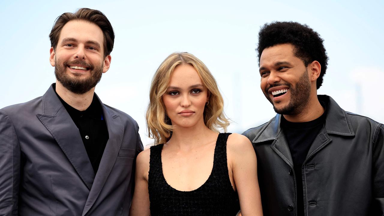 Lily-Rose Depp with director Sam Levinson and co-star The Weeknd pose during a photocall for the film The Idol at the Cannes Film Festival in May. Picture: Valery Hache/AFP