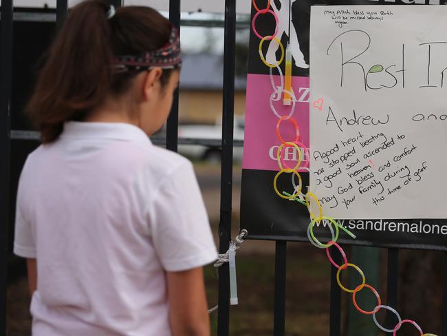 Tributes left at the Greenacre school today. Picture: John Grainger