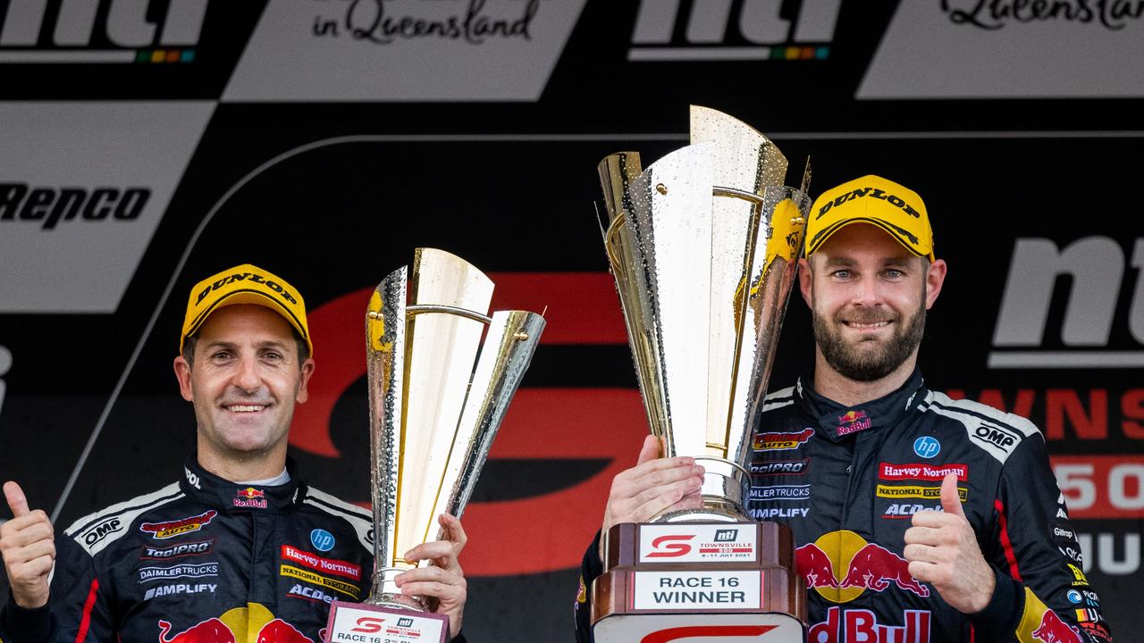 TOWNSVILLE, AUSTRALIA - JULY 11: (L-R) 2nd place Jamie Whincup drives the #88 Red Bull Ampol Racing Holden Commodore ZB and 1st place Shane van Gisbergen drives the #97 Red Bull Ampol Holden Commodore ZB celebrate after race 2 of the Townsville 500 which is part of the 2021 Supercars Championship, at Reid Park, on July 11, 2021 in Townsville, Australia. (Photo by Daniel Kalisz/Getty Images)