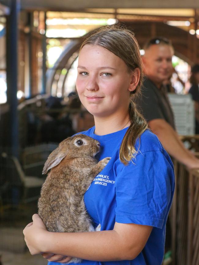 Tahlia Shean, 15, enjoying day two of the Royal Darwin Show. Picture: Glenn Campbell