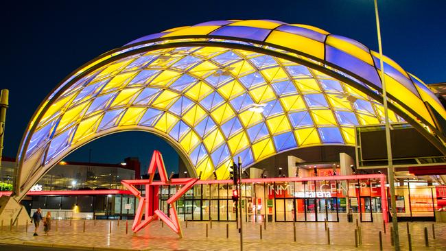 The Adelaide Entertainment Centre lit up in blue and yellow, in solidarity of Ukraine. Picture: Morgan Sette