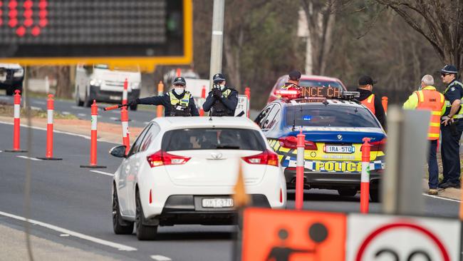 Victoria police have set up a check point near the NSW Victorian border between Albury Wodonga on the Lincoln Causeway. Picture: Simon Dallinger