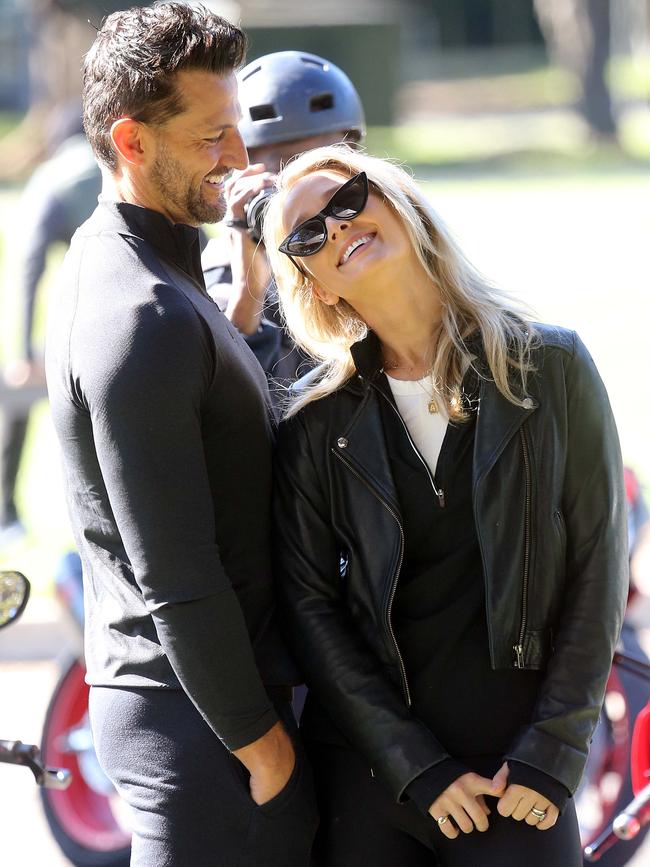 The couple enjoy the autumn sunshine at Rose Bay. Picture: Matrix