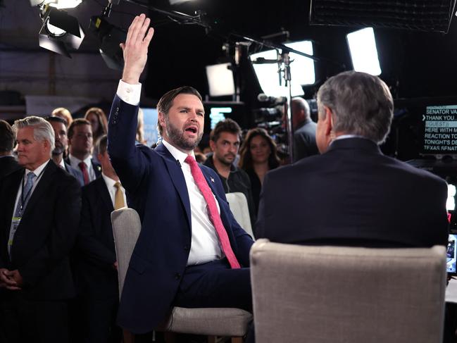 US Senator and Republican vice presidential candidate J.D. Vance gestures as he speaks to a Fox News reporter in the spin room after participating in the Vice Presidential debate with Minnesota Governor and Democratic vice presidential candidate Tim Walz hosted by CBS News at the CBS Broadcast Center in New York on October 1, 2024. (Photo by CHARLY TRIBALLEAU / AFP)