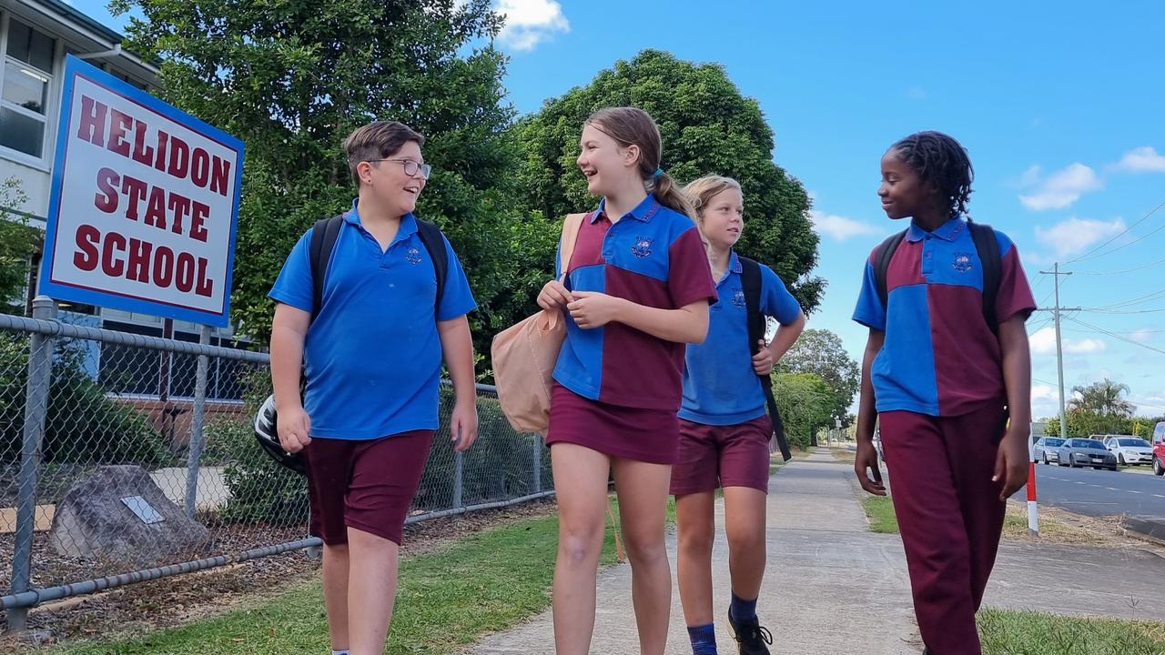 Helidon State School students (from left) Leith Hahn, Amie Frost, Walter Gunneen and Zipora Muhiire and their classmates are participating in Walk Safely To School Day on Friday.
