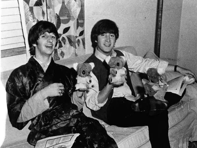 Ringo and John with their souvenirs of Australia.