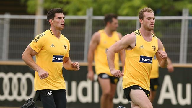 Jaeger O'Meara and Tom Mitchell will be part of Hawthorn’s best 22. Picture: Wayne Ludbey