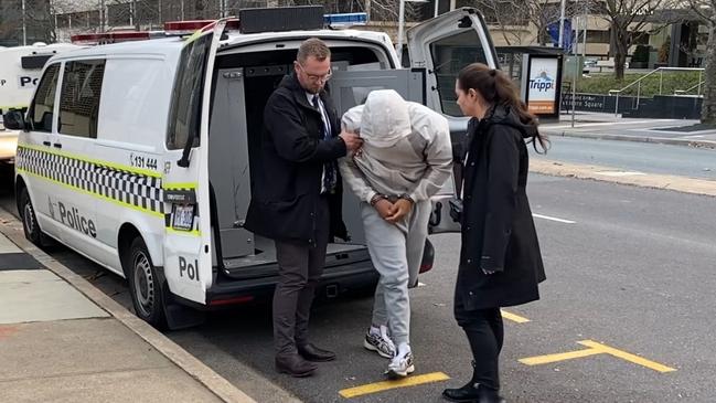 Raven Pauga arrives at Canberra’s City Police Station on Tuesday, following his extradition from Sydney. Picture: ACT Policing