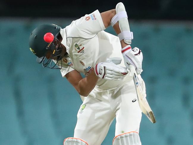 SYDNEY, AUSTRALIA - DECEMBER 11: Harry Conway of Australia A is hit on the helmet from a bouncer bowled by Mohammed Siraj of India during day one of the tour match between Australia A and India at Sydney Cricket Ground on December 11, 2020 in Sydney, Australia. (Photo by Brendon Thorne/Getty Images)