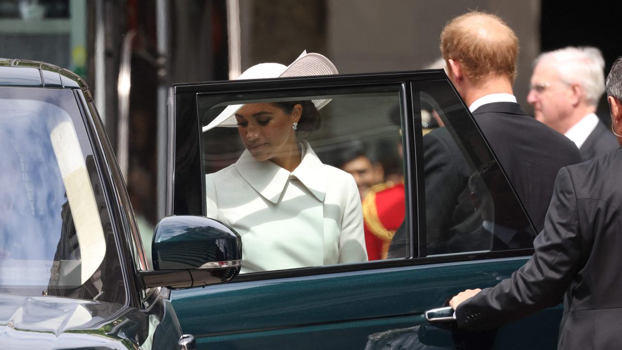 The Duke and Duchess of Sussex arrived at Friday’s service of thanksgiving in a Range Rover. Picture: Hollie Adams/AFP