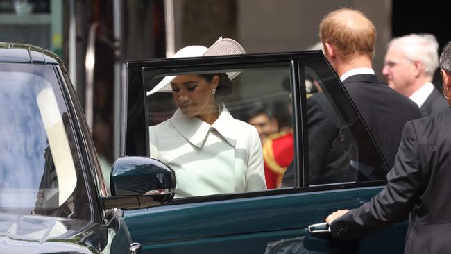 The Duke and Duchess of Sussex arrived at Friday’s service of thanksgiving in a Range Rover. Picture: Hollie Adams/AFP