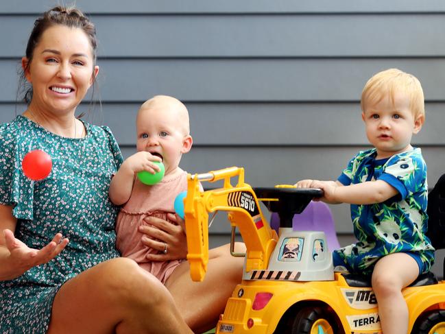 Owner Cassandra Bourke with Evie Dignam, 14 months, and Iva Thompson, 11 months, at Goodlife Kindergarten and Child Care in Park Ridge. Pics Tara Croser.