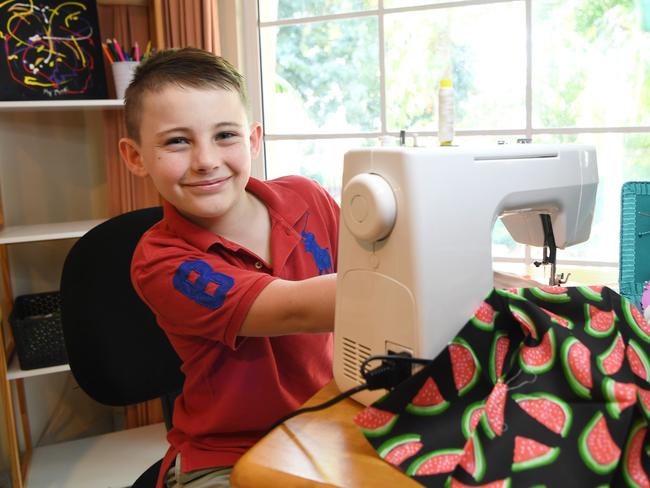 Angus Copelin-Walters is a 10 year old student at Parap Primary School who lives in Fannie Bay. he's spent the lock down learning how to sew in order to make coasters and walking frame bags for the elderly.   Picture Katrina Bridgeford.