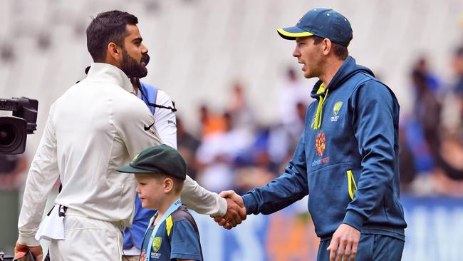 Australian captain Tim Paine congratulates Indian captain Virat Kohli after the Test. Pic: AFP