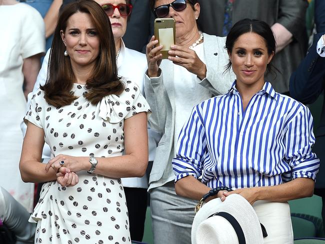 The Duchess of Cambridge and The Duchess of Sussex at Wimbledon in July. Picture: MEGA