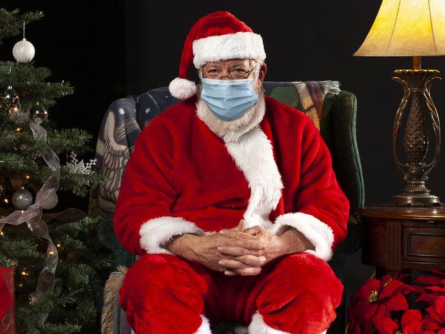 Santas will be required to wear masks this year