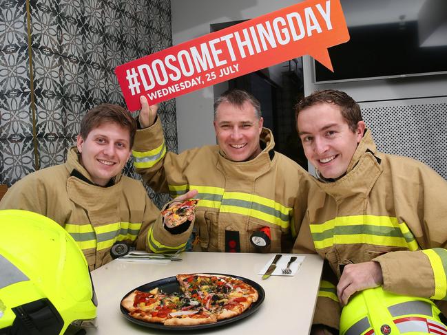 Club Toukley supports Do Something Day every year. Today they are offering free pizza..Firefighter Cale Henly, Captain Steve McKay and Firefighter Ben Williams from Toukley Fire Station at Club Toukley 3rd July 2018.(AAP Image/Sue Graham)