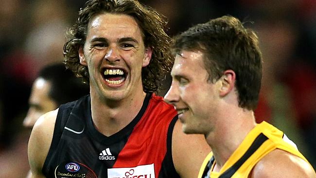 Joe Daniher gets stuck into Dylan Grimes after kicking a goal. Picture: Wayne Ludbey