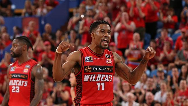 This is MY house! Bryce Cotton celebrates an overtime three-pointer. Picture: Getty